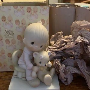 Precious Moments figurine ‘Bear ye one another’s burdens.’